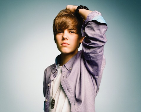 justin bieber smiling with his new haircut. Teen hearthrob Justin Bieber