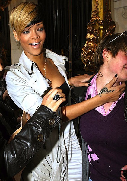 Of all tattoo's, a Rihanna tattoo….on your neck?