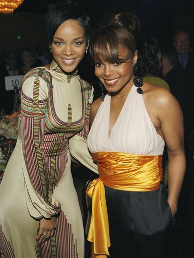 Rihanna, left, and Janet Jackson pose together at the Clive Davis pre-Grammy party in Beverly Hills, Calif. on Saturday, Feb. 9, 2008. (AP Photo/ Matt Sayles)