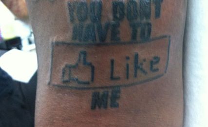 T-Pain Gets Facebook Tattoo