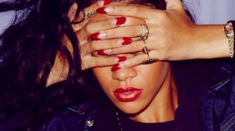 Watch: Rihanna Fights Microphone At 'Paris Fashion Week'