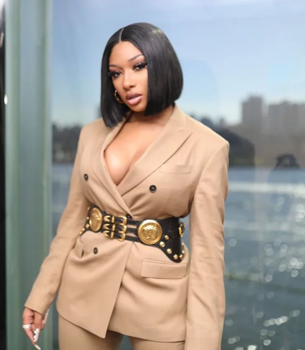 Megan Thee Stallion's record label CEO Carl Crawford denies they