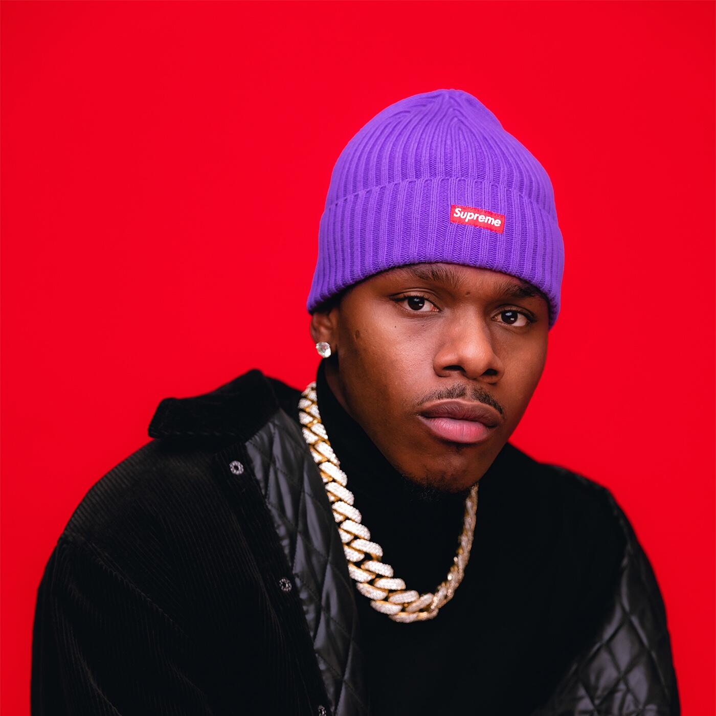 The red-and-white blue striped sweater worn by DaBaby on the cover