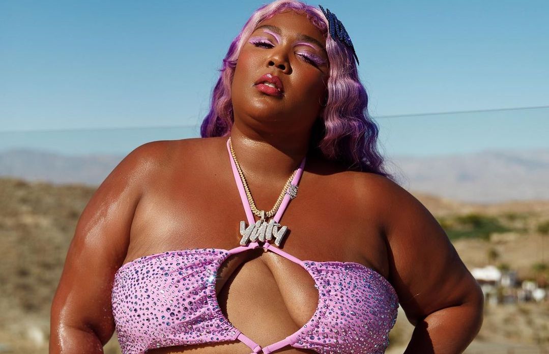 Lizzo's breast spill out as she flaunts her body in fur bikini