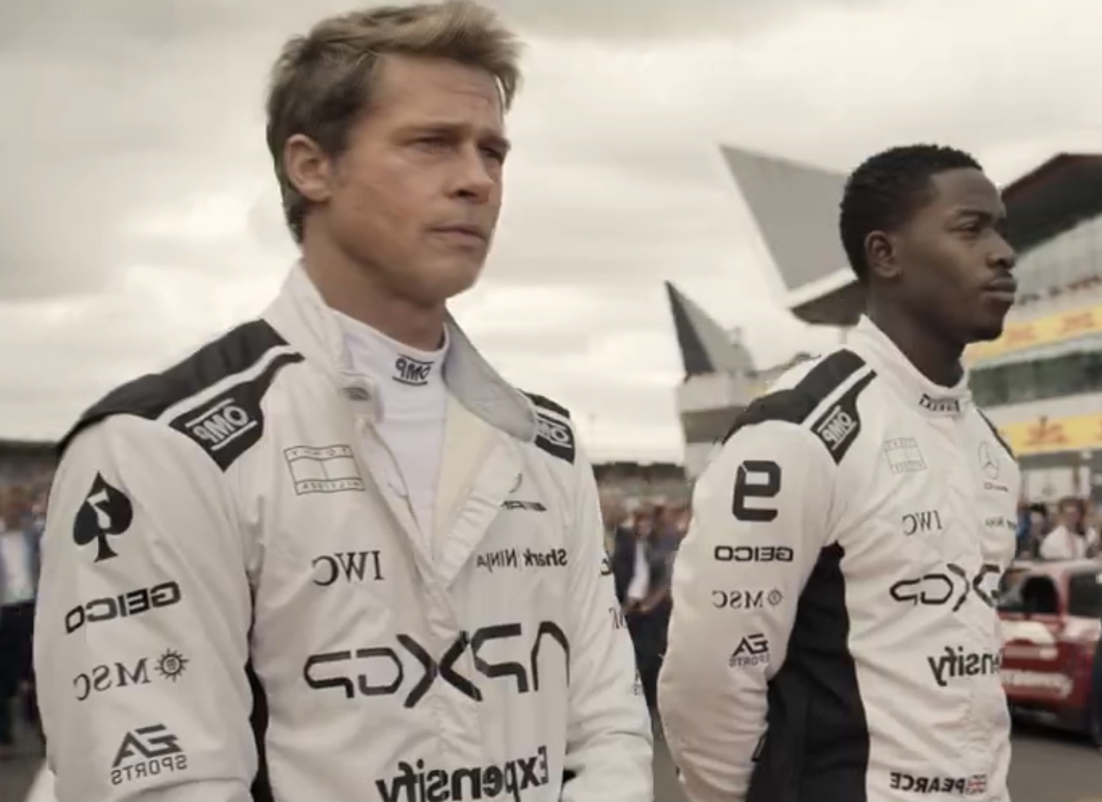 First Look: Brad Pitt & Damson Idris Buckle Up in ‘F1’ Movie